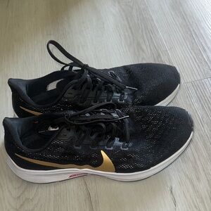 Nike Black and Gold Athletic Sneakers